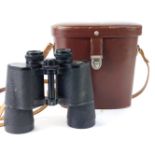 A set of Carl Zeiss Jena binoculars, 10x50w labelled DDR in brown leather travel case.
