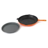 A Le Crueset saute pan, 31cm diameter, and a flan dish. (2)