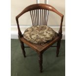 A Victorian walnut corner chair, with turned legs and X frame stretcher. (AF)