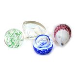 Four glass paperweights, comprising Wedgwood crystal kingfisher, Langham green swirl, Wedgwood red g