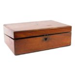 A late 19thC walnut writing box, with a fitted and lined purple interior, an outer crest bearing the