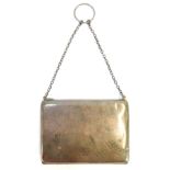 A Victorian white metal coin purse, of plain design, with a green lined interior, hallmarks rubbed,