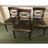 Three George III mahogany dining chairs, comprising two dining chairs and one carver, each having eb