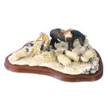 A Border Fine Arts figure group, of horse and sheep at feeding time, on wooden base, 35cm wide.
