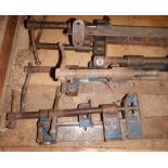 A collection of sash clamps.