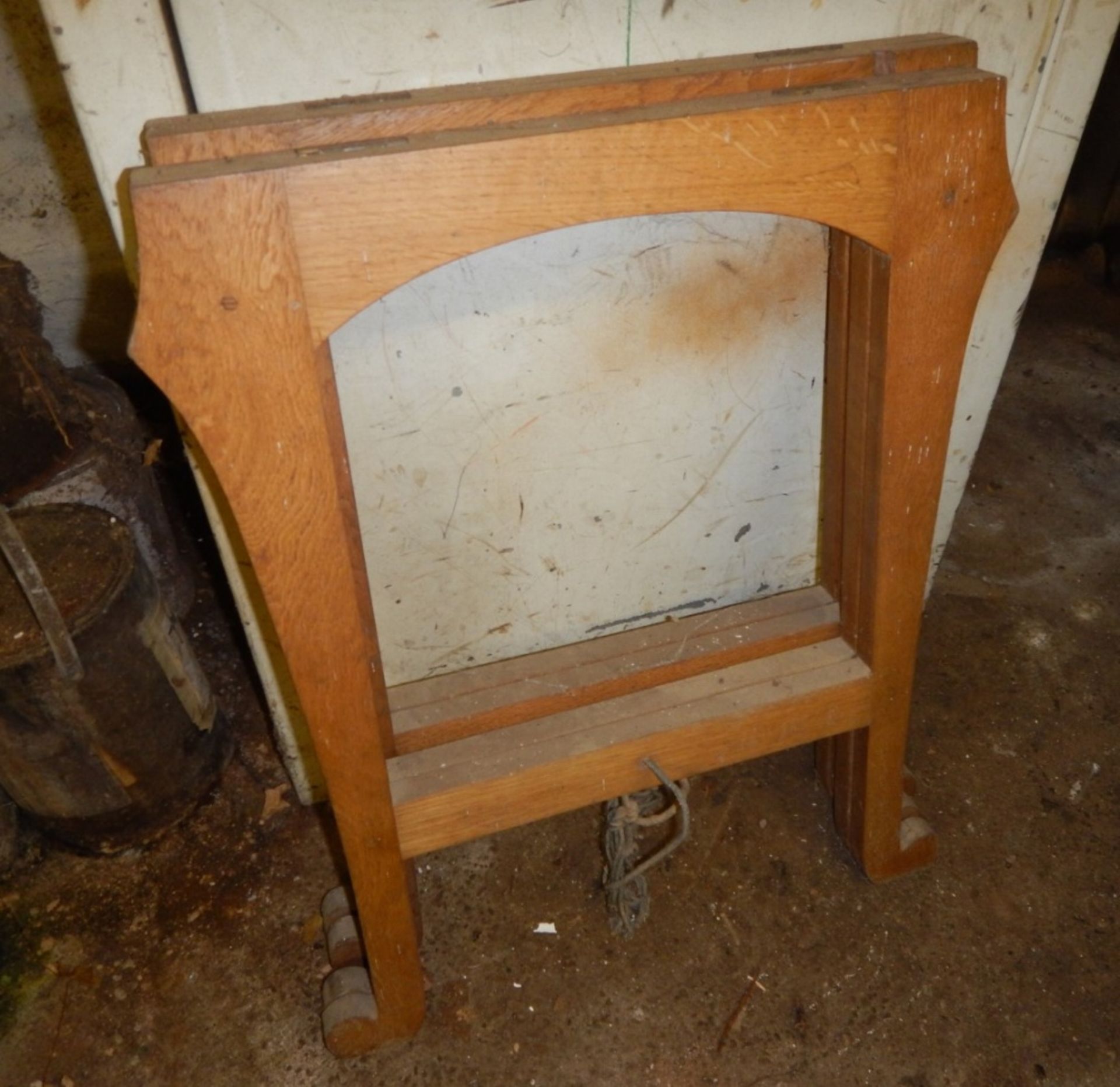 Pair of folding oak coffin trestles.