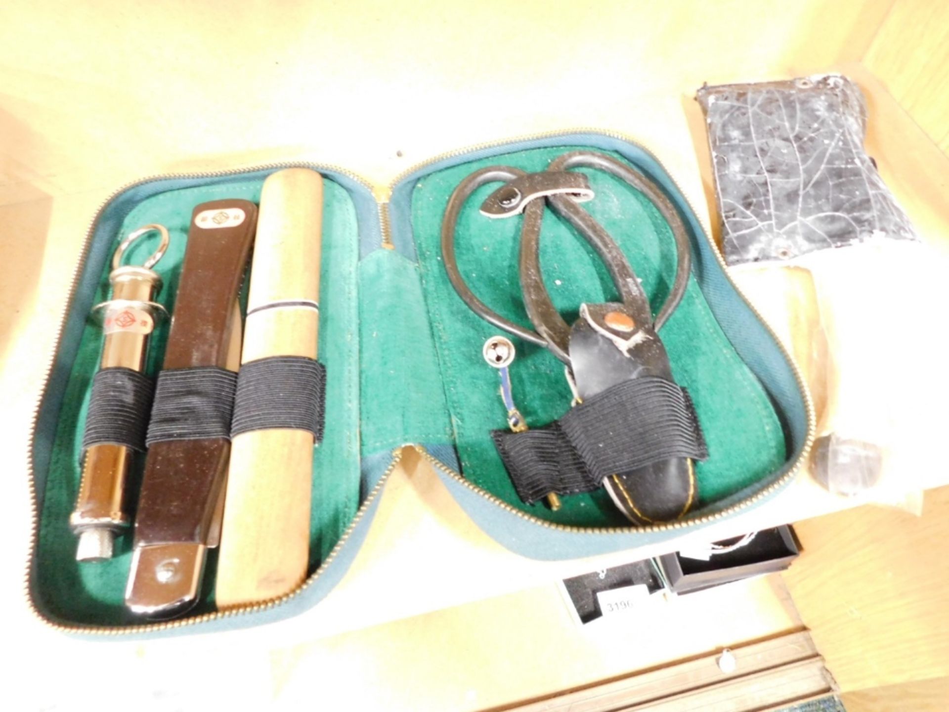 A Chinese travelling doctor set, with associated cleaver and syringe, etc., in case.