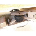 A reel of armored cable and other residual contents under bench. VAT is also payable on the hammer p