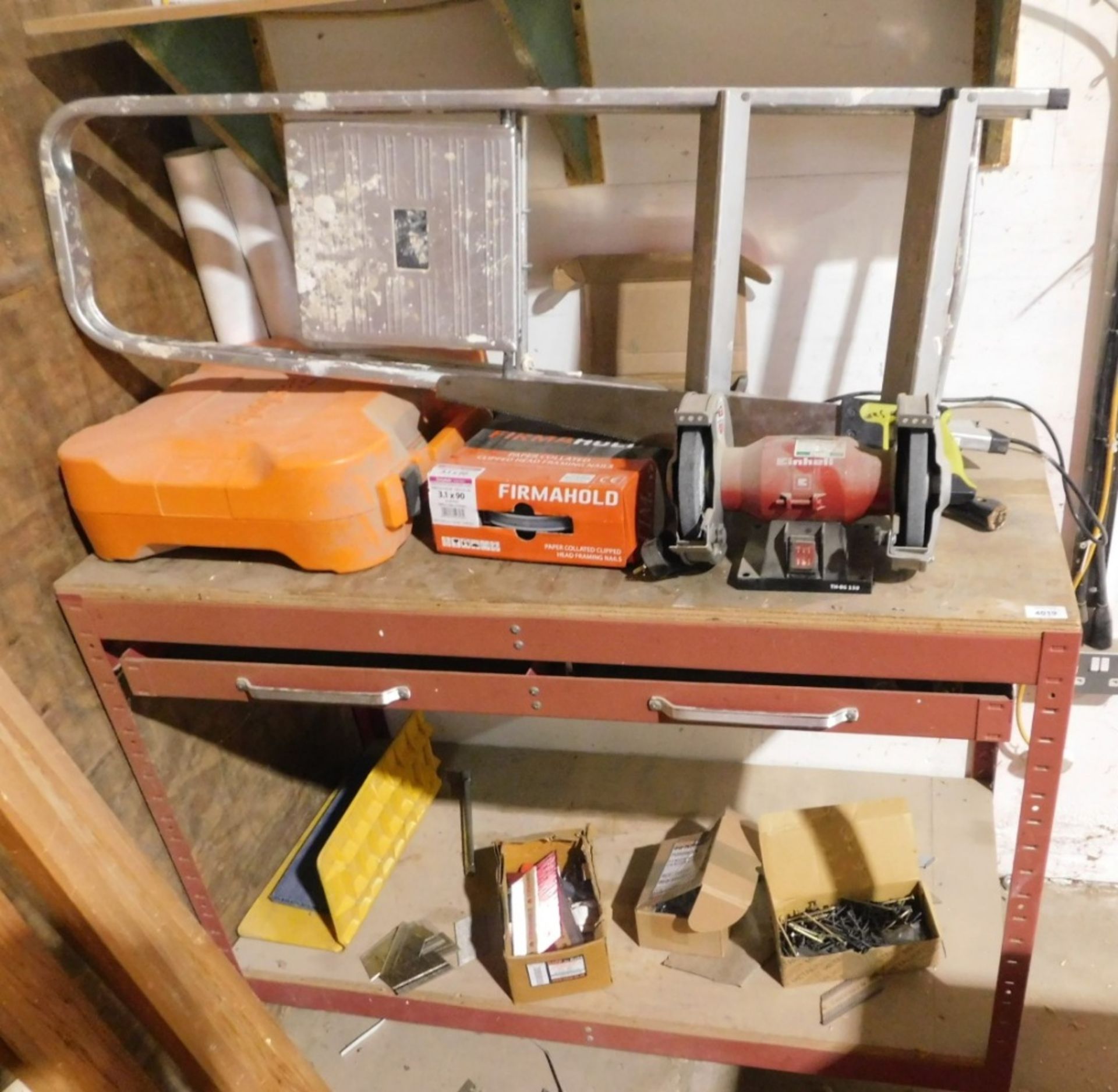 A work bench with grinder, single phase, and various sundries. VAT is also payable on the hammer pri