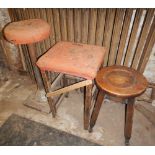 A work bench stool and two others. (3)