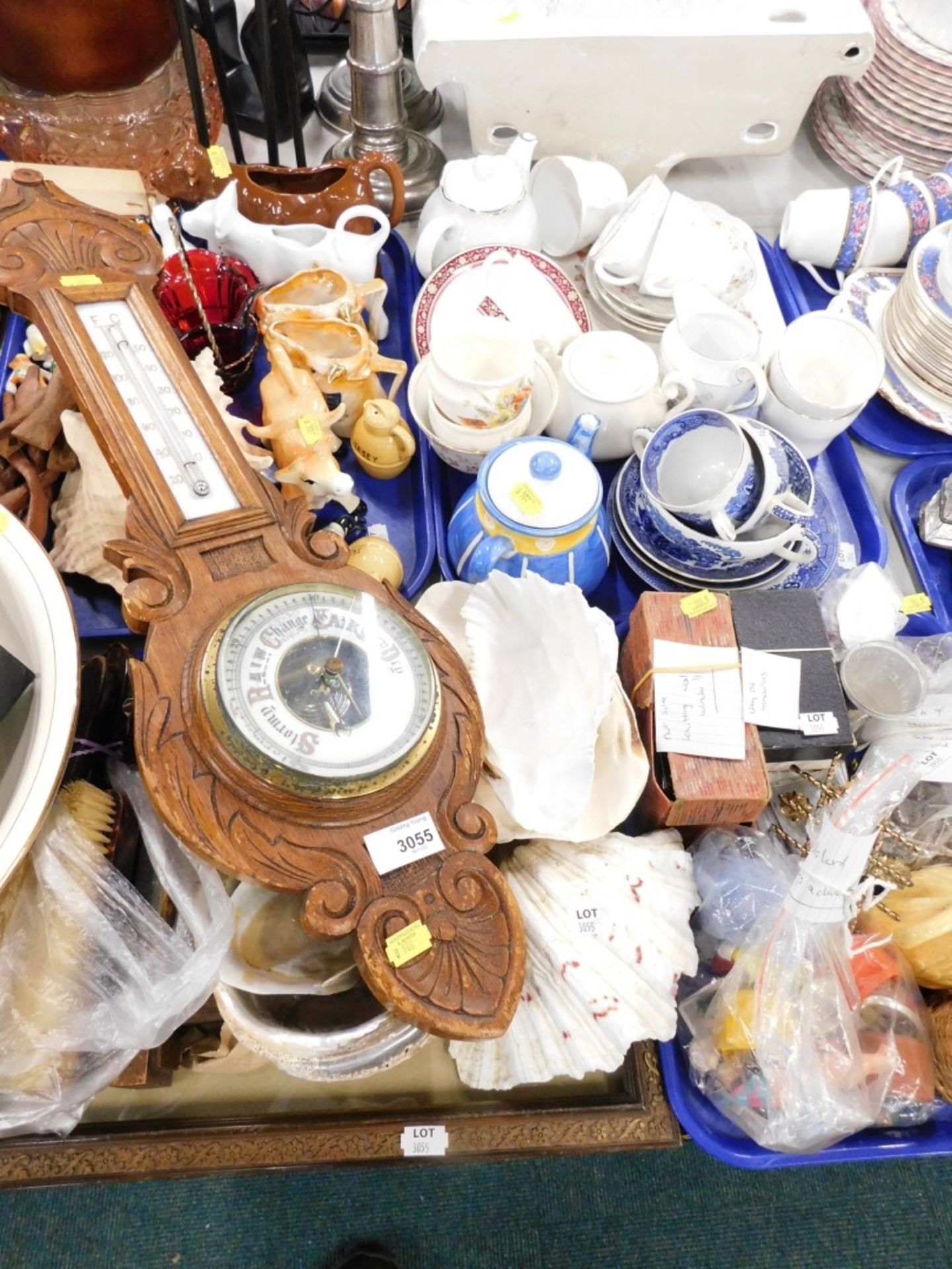 Household glassware and effects, china, pottery cow creamers, oak barometer, seashells. (2 trays and