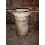 A stoneware chimney pot.