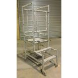 An aluminium portable one man decorator or works access platform. VAT is also payable on the hammer