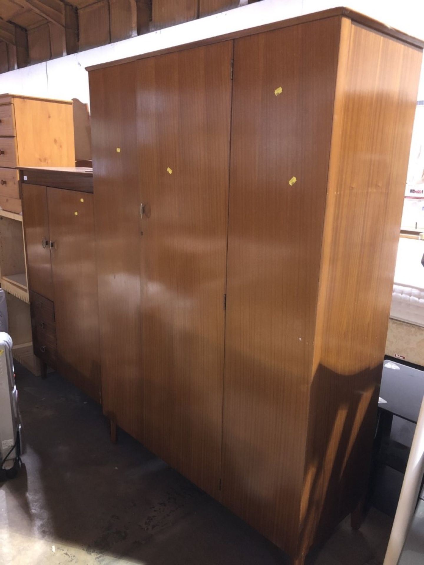 A 1960s Lebus double wardrobe, headboard and tallboy. (3) This lot is available to view Tuesday 15th