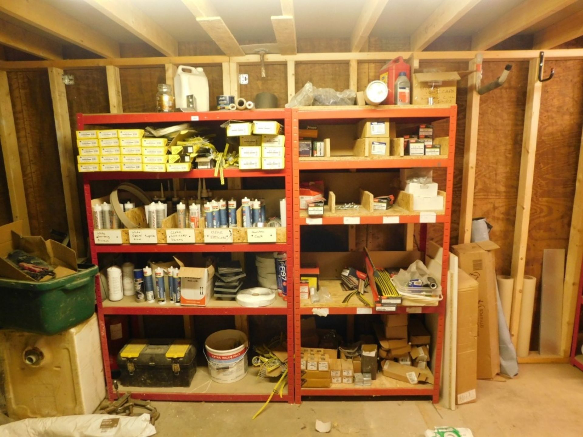 Two red steel part racking units and entire contents stock, of self drilling dry wall screws, light