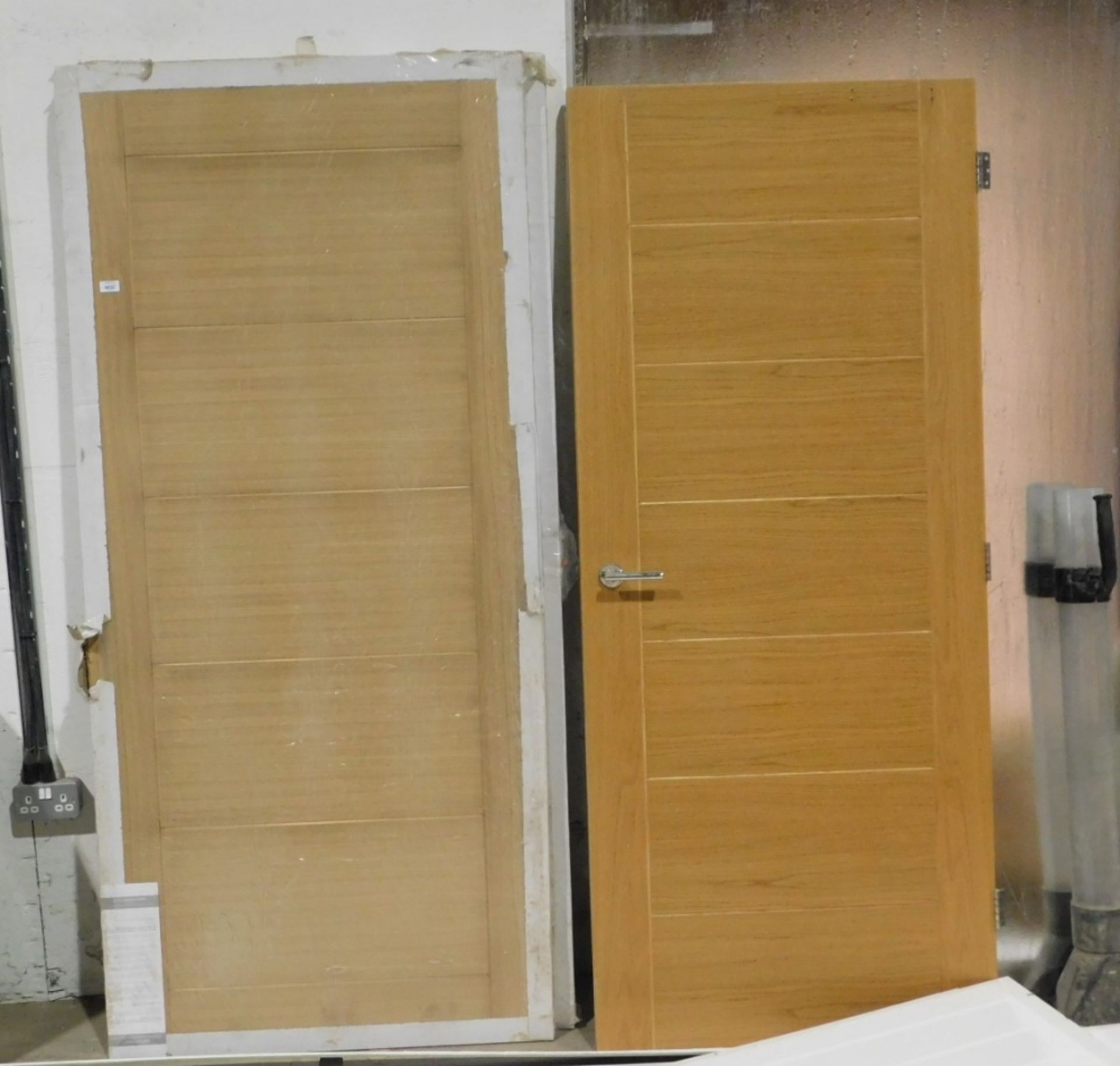 Deanta oak pre finished interior doors, two packaged and marked Sivill, 240mm x 926mm x 40mm, the th