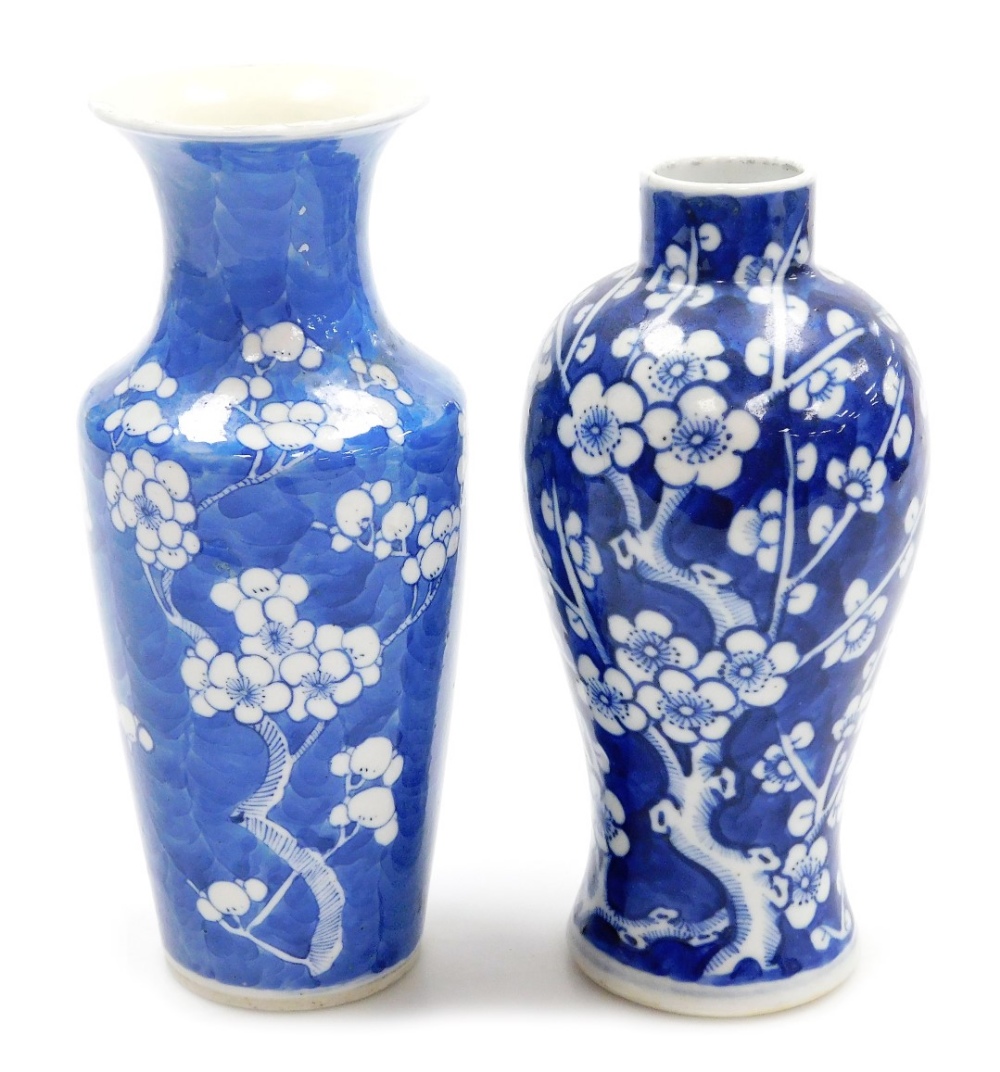 A Chinese blue and white vase, of baluster form, decorated with blossoming prunus on a cracked ice g