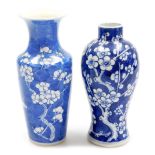 A Chinese blue and white vase, of baluster form, decorated with blossoming prunus on a cracked ice g