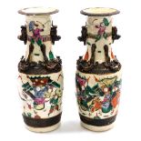 A pair of Chinese crackle glaze vases, of baluster form, with applied dog of fo handles and chilin t