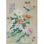 A Japanese watercolour on silk, depicting bird on flowering branch, with calligraphy, 40cm x 29cm.