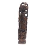 A 20thC Chinese hardwood carving of Shou Lao, the figure holding staff and a peach above a three cla