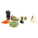 A group of Chinese jade and hardstone items, including figures, two tortoises, and a circular pendan