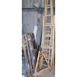 A quantity of bamboo ladders, to include three stained bamboo ladders of tapering form, 117cm high,