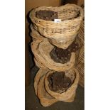 A quantity of wicker heart shaped baskets, each with a raised side, the largest 39cm wide. Note: V