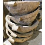 Five hardwood two handled bowls, each approx 67cm wide. Note: VAT is payable on the hammer price of