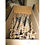 Two boxes of wooden child's coat hangers, each 40cm wide. Note: VAT is payable on the hammer price