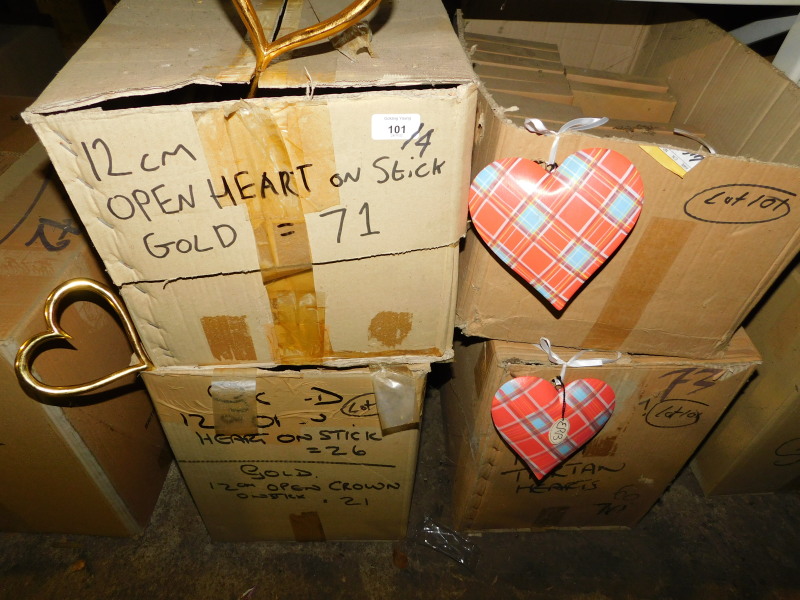A group of gold coloured open heart decorations on sticks, 12cm high, and a quantity of tartan woode