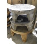 Three hardwood plant stands, each on four carved legs, 27cm high, 59cm diameter. Note: VAT is payabl