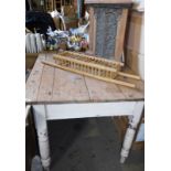 A pine kitchen table, the rectangular top above a painted base, on turned legs, 74cm high, the top 1