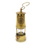 A Protector Lamp and Lighting Company brass miner's lamp, 27cm high.