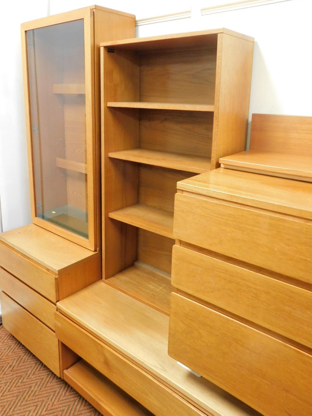 A vintage 1960's teak modular lounge unit, comprising a glazed cabinet on a three drawer chest base, - Image 2 of 3