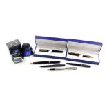 A group of fountain and other pens, to include a Waterman fountain pen in black casing with a gold c