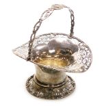 An Edward VII silver basket, of waisted and flared form, with pierced and embossed foliate and rococ