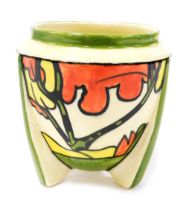 A reproduction Clarice Cliff Bizarre style pottery vase, of conical tapering form, decorated with tr