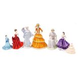 A group of Wedgwood, Coalport and Royal Doulton porcelain figures, comprising Royal Doulton Pretty L