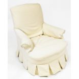 A Victorian mahogany nursing chair, with a modern cream patterned loose cover, raised on turned and