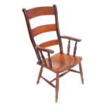 A Victorian beech ladder back kitchen chair, with a solid saddle seat, raised on ring turned legs, u