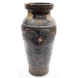 A Japanese Meiji period earthenware vase from the Tokoname kilns, relief decorated with sages and ot