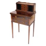 A reproduction Georgian mahogany lady's writing table, the galleried top super structure with three