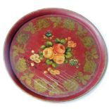 A toleware tray, painted with roses and other flowers, within a border of vines, against a red groun