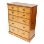 A Victorian pitch pine chest of two short over four long graduated drawers, raised on a plinth base,