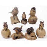 A group of Poole buff pottery figures, of animals and birds. (7)