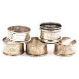 A pair of Victorian silver napkin rings, with engraved decoration, vacant shield reserve, Birmingham