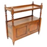 A Victorian mahogany buffet, with a galleried top raised on turned supports with a cupboard below, o