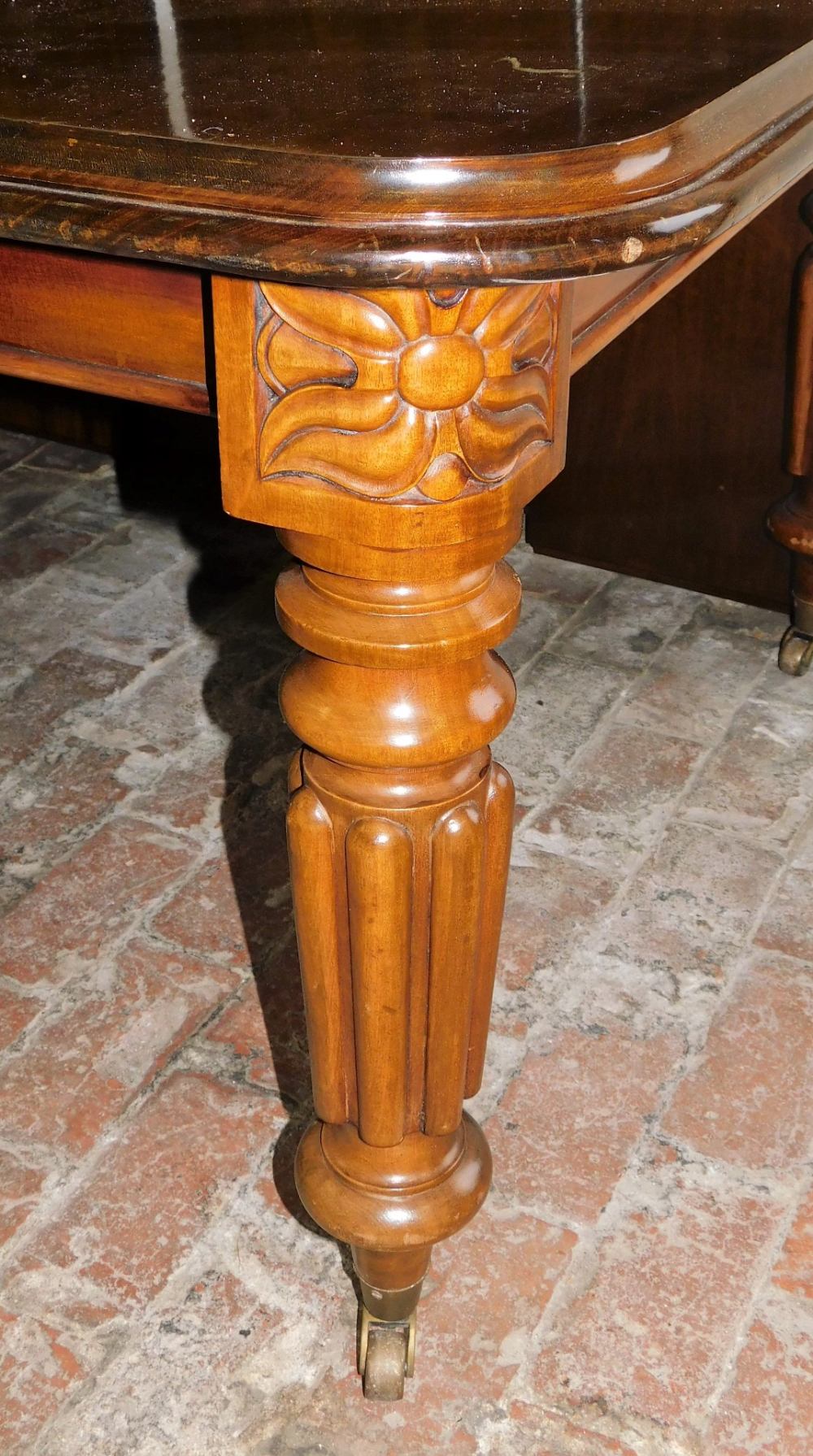 A Victorian style mahogany draw leaf dining table, with three additional leaves, raised on turned an - Image 2 of 3