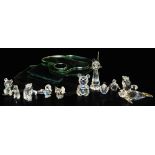 Swarovski crystal figures, with canisters, including a seated cat, duckling, teddy bear, further bir